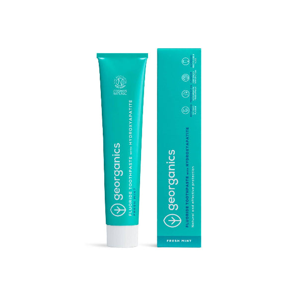 Georganics fluoride toothpaste with hydroxyapatite for oral care, featuring fresh mint flavor and packaging box.