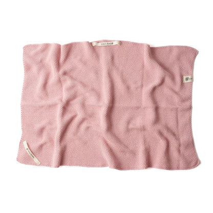 Knitted cotton hand towel in Rose pink shown unfolded