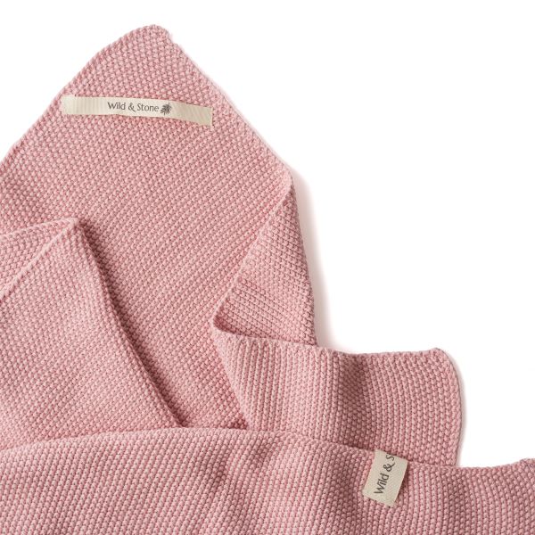 Knitted cotton hand towel in Rose pink shown close up
