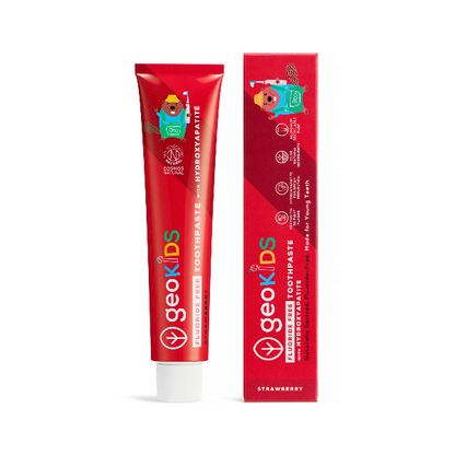 Kids hydroxyapatite toothpaste fluoride free in red aluminium tube next to cardboard packaging
