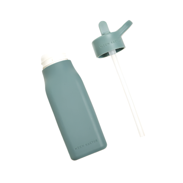 Kids reusable silicone bottle in Happy Camper colourway (an olive green) shown with straw lid alongside