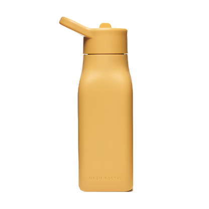 Kids reusable silicone bottle in Summer Sun colourway (a bright mustardy yellow) shown with straw lid on