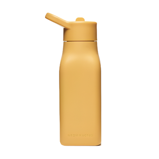 Kids reusable silicone bottle in Summer Sun colourway (a bright mustardy yellow) shown with straw lid on