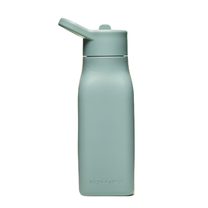 Kids reusable silicone bottle in Happy Camper colourway (an olive green) shown with straw lid on