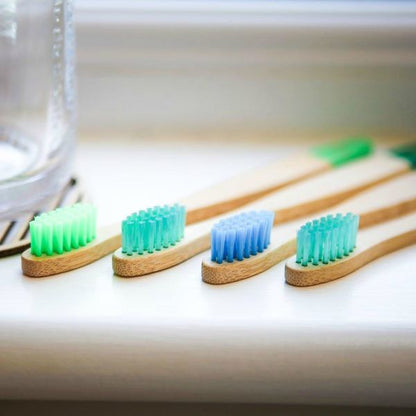 Kids bamboo toothbrush set, pack of 4 in aqua colourways (blues and greens)