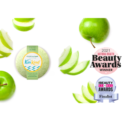 KinKind CLEAR my head! shampoo bar shown with award logos (Natural health Beauty Awards winned 2021, Beauty Global awards finalist 2020) on a white background with green apples