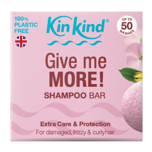 KinKind Give me MORE! shampoo bar in cardboard packaging with pink background and text reading "100 plastic free, up to 50 washes, Extra care and protection for damaged, frizzy and curly hair."