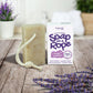 Friendly Soap soap on a rope in classic lavender shown alongside cardboard box