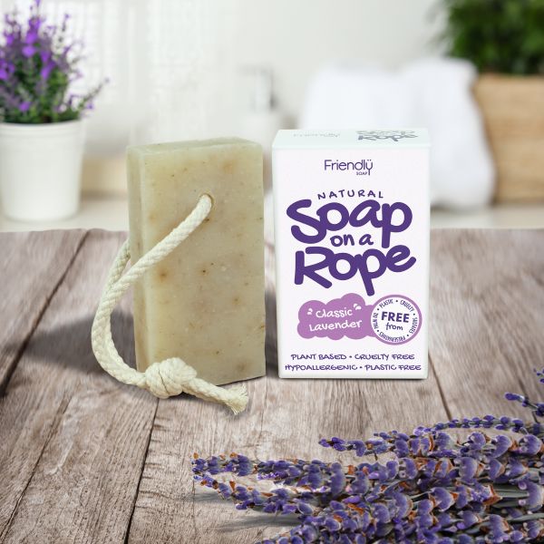 Friendly Soap soap on a rope in classic lavender shown alongside cardboard box