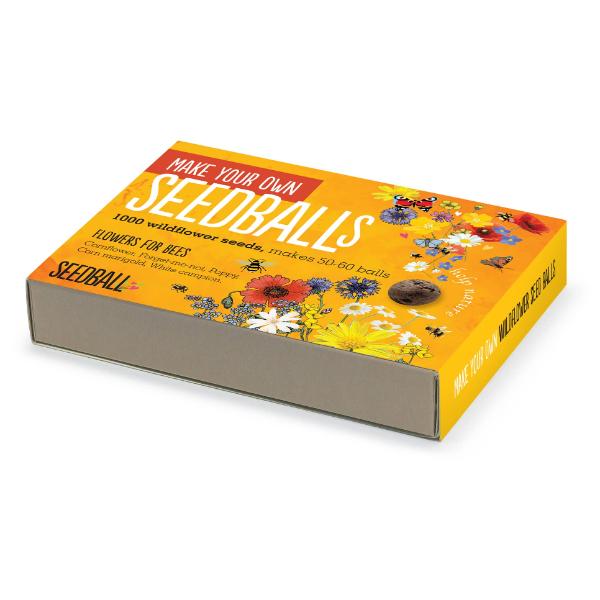 Box of 'Make Your Own Seedballs' with illustrations of flowers and seeds on a white background