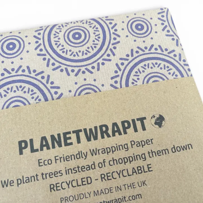 Brown kraft paper with blue mandala pattern with paper label