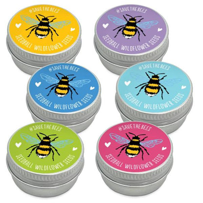 Set of six small seedball tins with colourful lids featuring bee illustrations and 'Save the Bees' text.