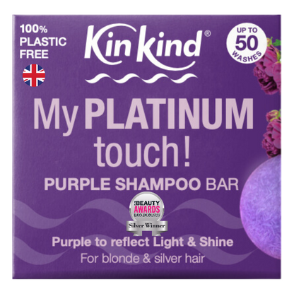 Purple shampoo bar packaging with 'Kinkind' branding and text reading 100% plastic-free, award-winning product and "purple to reflect light and shine"