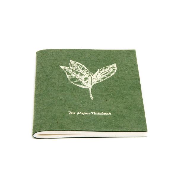 Green tea paper notebook with leaf design and 'Tea Paper Notebook' text on a white background
