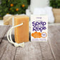 Friendly Soap soap on a rope in zesty orange and grapefruit shown alongside cardboard box