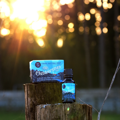 Outdoorsman soap bar alongside beard oil