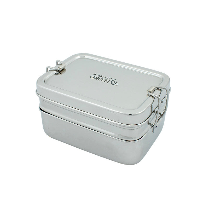 Stainless steel two tier lunch box on light background