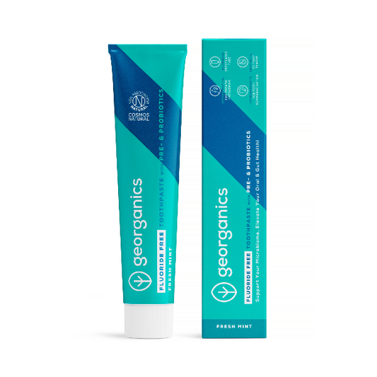 Prebiotic and probiotic toothpaste in aluminium tube alongside cardboard packaging