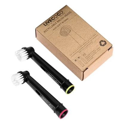 Two Live Coco recyclable electric toothbrush junior heads shown side by side next to cardboard packaging