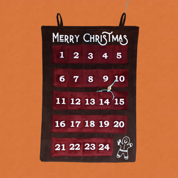 Handmade advent calendar with burgundy numbered felt boxes