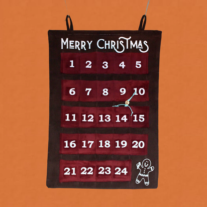 Handmade advent calendar with burgundy numbered felt boxes