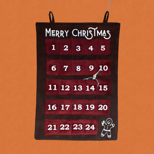 Handmade advent calendar with burgundy numbered felt boxes