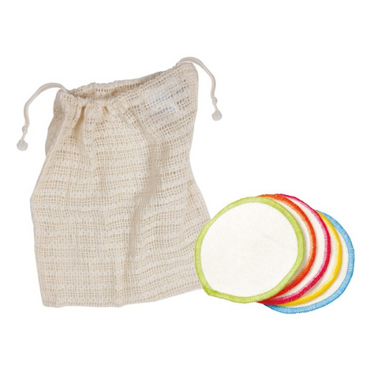 Reusable organic cotton make up wipes shown alongside net cotton washbag