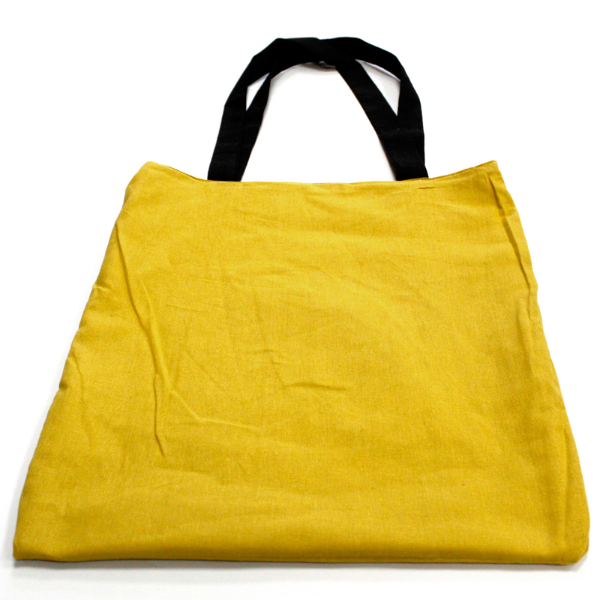 Fish reversible bag shown with yellow lining on outside
