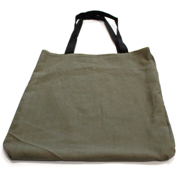 Turtle reversible bag shown with grey lining on outside