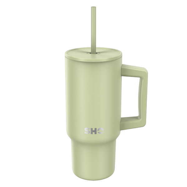 SHO reusable insulated large tumbler in sage green shown with straw lid