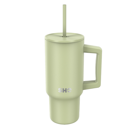 SHO reusable insulated large tumbler in sage green shown with straw lid