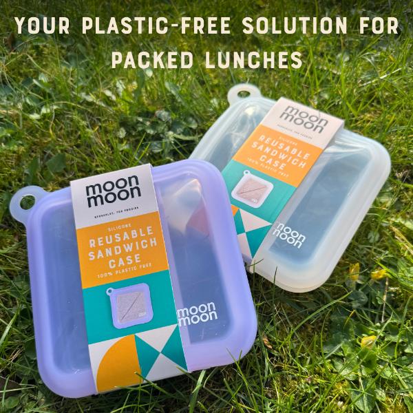 Reusable silicone sandwich cases with 'moon moon' branding on a grass background