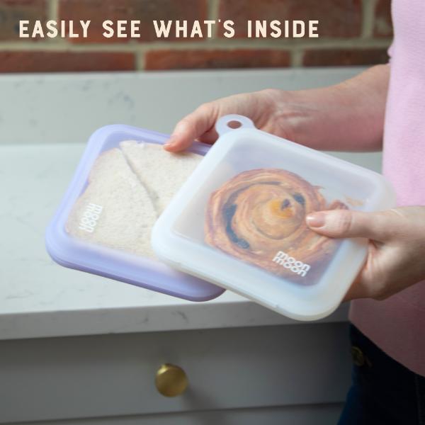 Person holding silicone sandwich cases with text reading "Easily see what's inside"