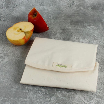 Organic cotton sandwich wrap by A Slice of Green, reusable food covering with green and white pattern for eco-friendly food storage.