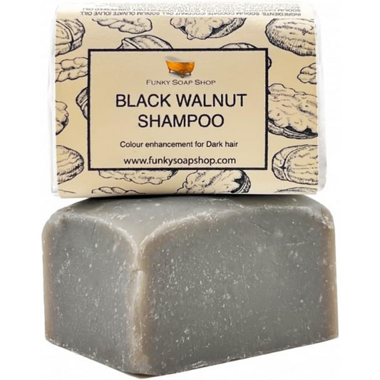 Black walnut eco-friendly shampoo bar for black hair shown with paper wrapping