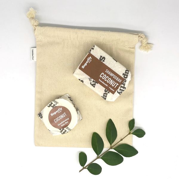 Superfly Soap shampoo and conditioner gift set in reusable cotton produce bag in coconut