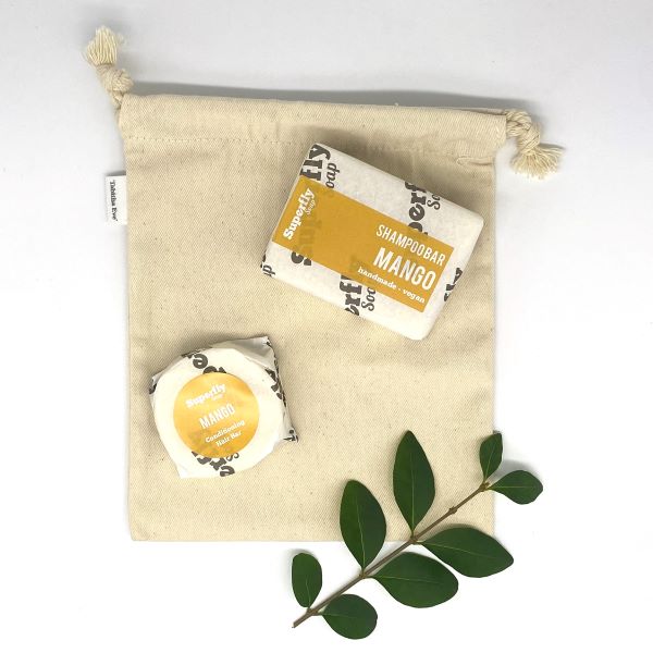 Superfly Soap shampoo and conditioner gift set in reusable cotton produce bag in mango