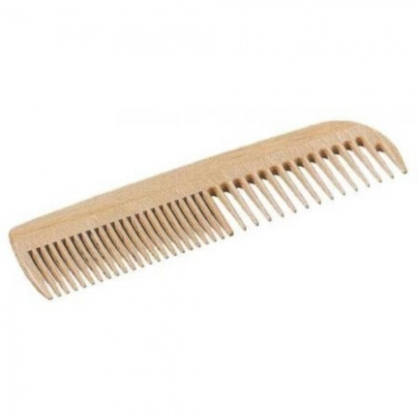 Short hair wooden comb on a white background