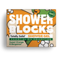Totally solid shower gel bar in sweet orange and bergamot, shown in orange and green cardboard packaging