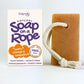Friendly Soap soap on a rope in zesty orange and grapefruit shown alongside cardboard box
