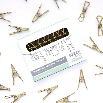 Stainless steel clothes peg (gold-coloured) in cardboard packaging