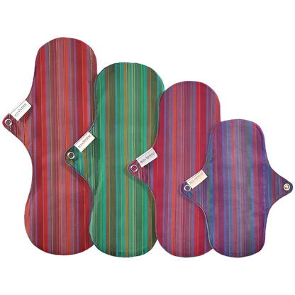Eco Femme vibrant reusable pads starter kit showing each of the 4 differently sized pads side by side. 