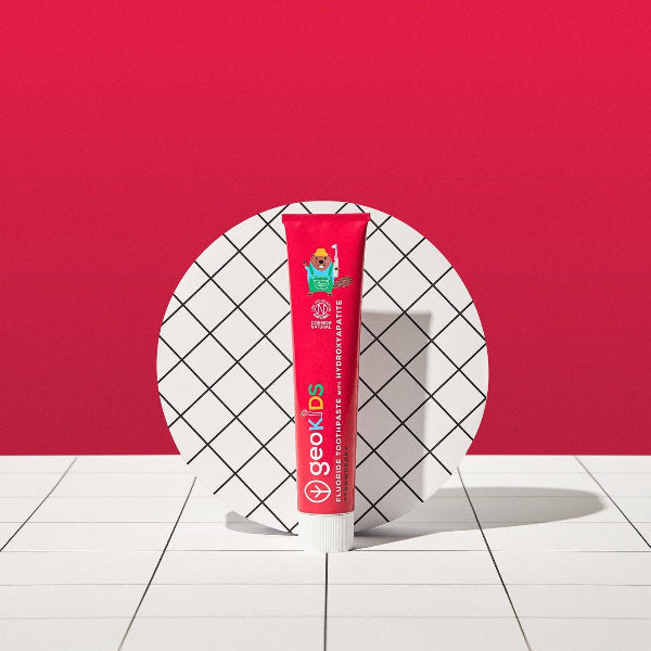 Kids hydroxyapatite toothpaste fluoride in red aluminium tube