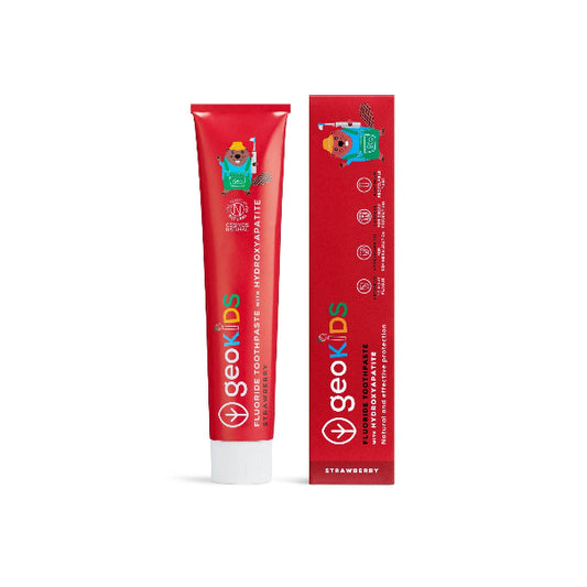 Kids hydroxyapatite toothpaste with fluoride in red aluminium tube next to cardboard packaging