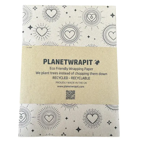 Planetwrapit eco-friendly wrapping paper with heart and sun patterns on brown kraft paper with paper label