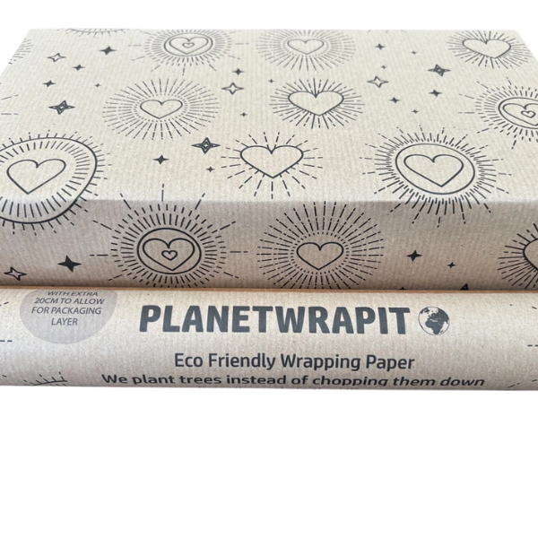 Planetwrapit eco-friendly wrapping paper with heart and sun patterns on brown kraft paper shown on a wrapped parcel