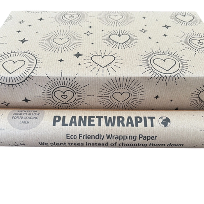 Planetwrapit eco-friendly wrapping paper with heart and sun patterns on brown kraft paper shown on a wrapped parcel