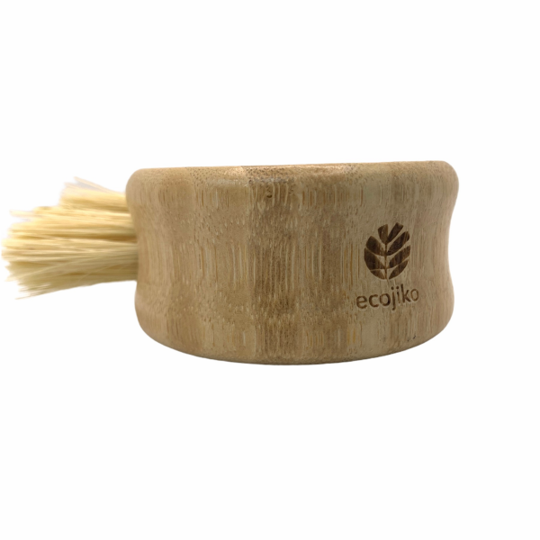 Bamboo vegetable brush shown close up with Ecojiko branding