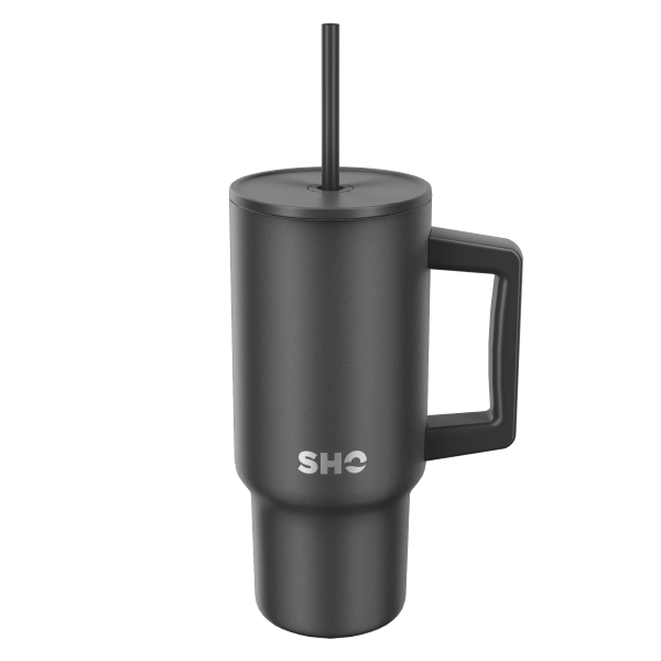 SHO reusable insulated large tumbler in jet black shown with straw