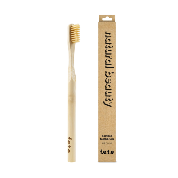 Bamboo toothbrush Natural beauty (natural bristles and brush) shown alongside cardboard box